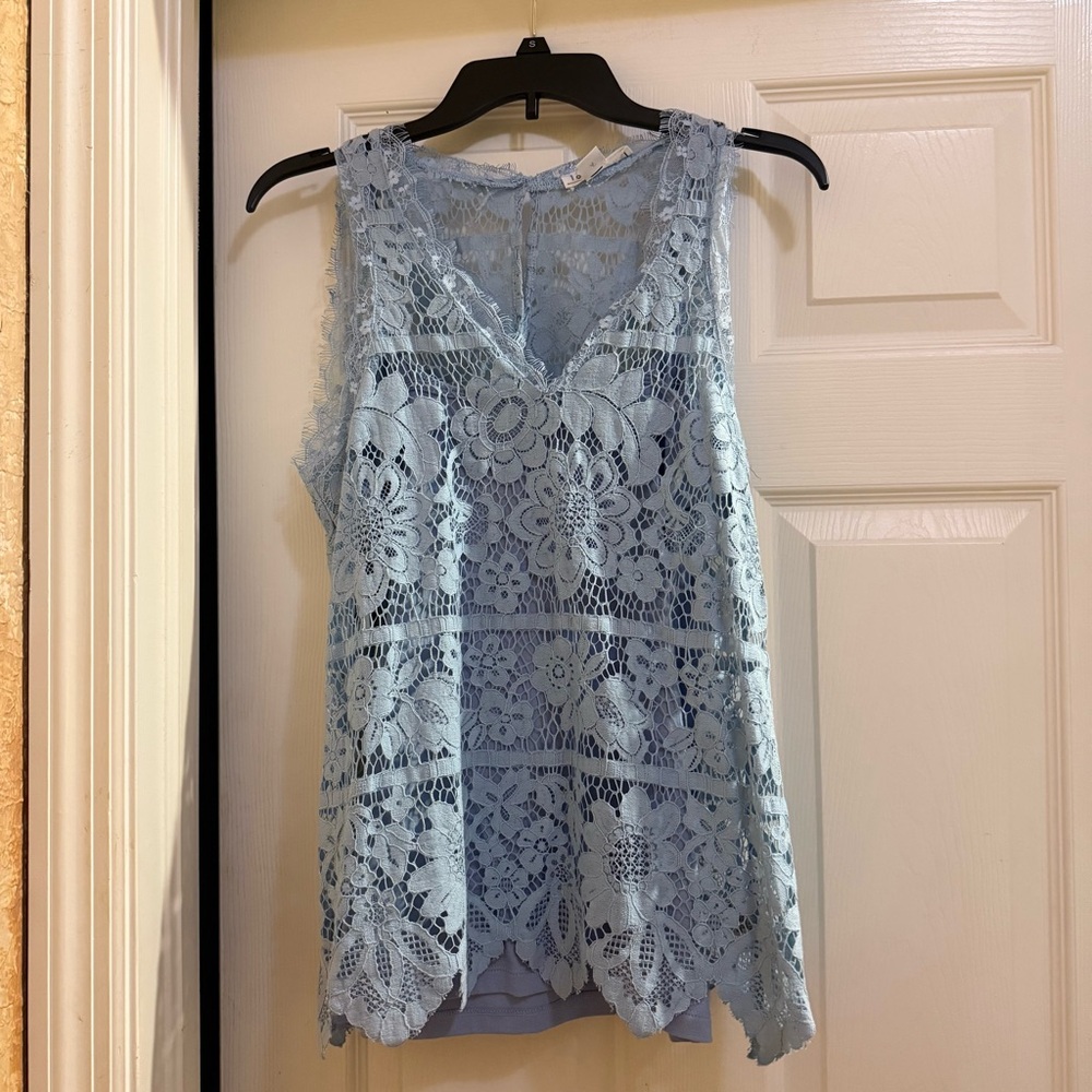 Elegant Lace Sleeveless Top - Light Blue with Tank Top.